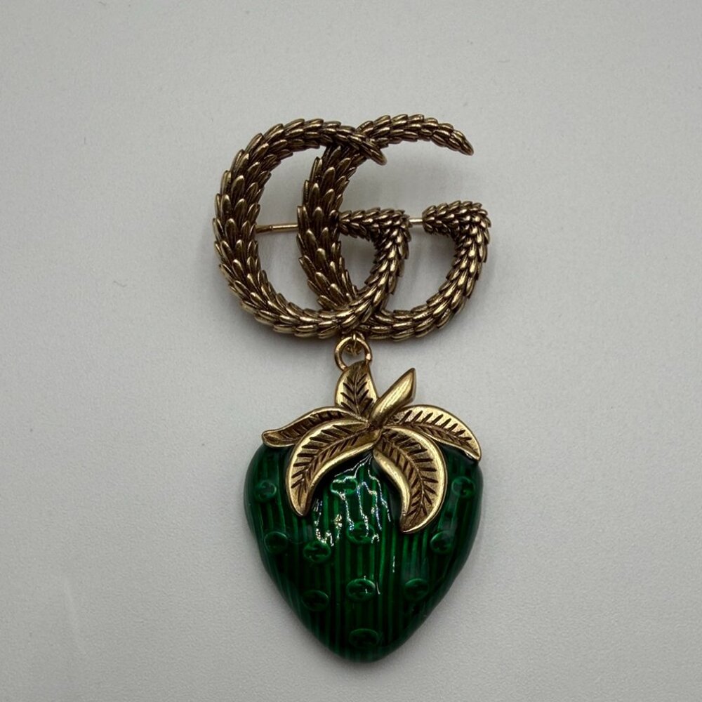 Green strawberry brooch
